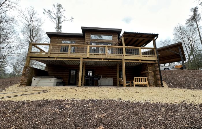 Luxury cabin in county but not far from downtown. Hot tub on back porch.