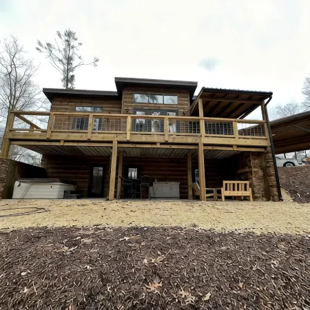 Luxury cabin in county but not far from downtown. Hot tub on back porch.