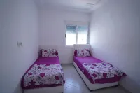 Charming 2-Bedroom Apartment with Garden View in Martil - Balkon