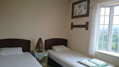 Twin Room with Extra Bed and Shared Bath and Toilet