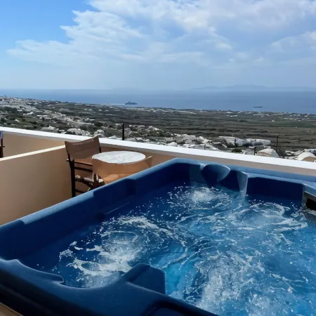 Panorama Oia Apartments Отели рядом с достопримечательностью «Пляж мыса Колумбо»