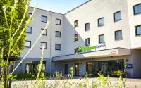 Holiday Inn Express Munich - Olching Отели в г. Фюрстенфельдбрук