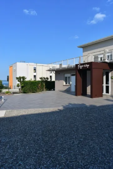 Poggio Al Lago Apartments & Rooms