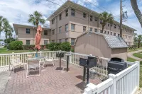 Cozy St. Pete Beach condo - Steps to the beach & sunsets + Heated pool