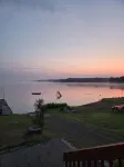 Rustic cabin getaway on the shore of Soo Lake in Phillips, WI