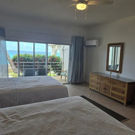 Beachfront condo at beautiful Cupecoy Beach Club.  2 bedroom, 3 bath, amenities!