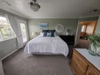 Golf Course Lakehouse with fantastic views of the lake, mountains & golf course.