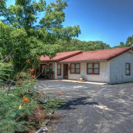 4-bedroom house in Utopia with 450’ of private crystal clear Sabinal river front