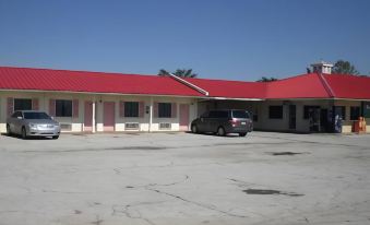 Super 7 Inn Siloam Springs - Housity
