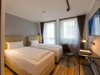 Nikii City Hotel Hotels near Wilhelm-Sollmann Strasse Station