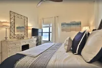 Beachfront corner unit with breathtaking ocean views!