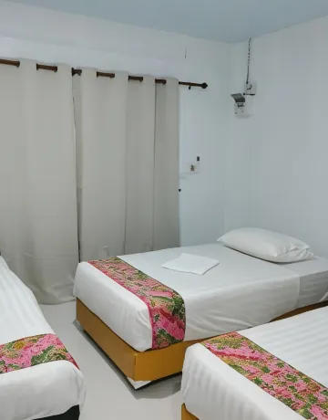 ห้องพักสำหรับสามท่านพร้อมระเบียง