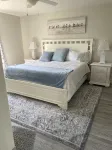 Refurbished villa with golf cart, great location, corner lot