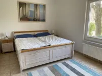 Vacation apartment "Seestern" with large garden in the heart of Pilsum - Homestays