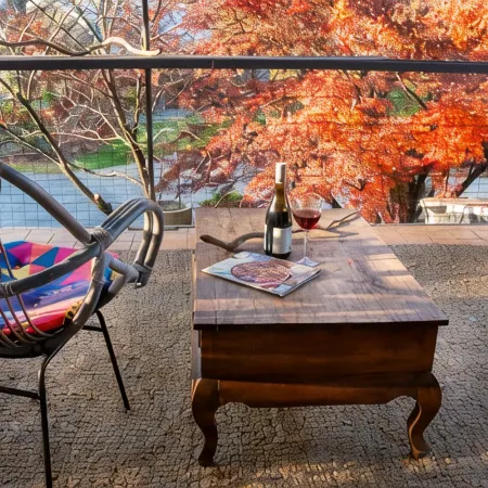 Tree Tops Apt @ Dreamers features log fire, mountain + pool views thru tree tops