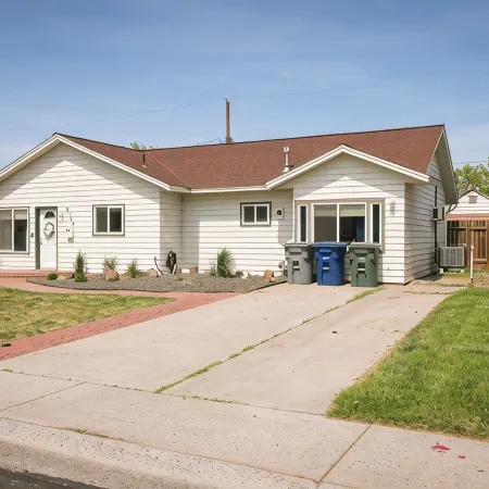 Family home, fully fenced yard with covered deck. Walk to trails and parks.