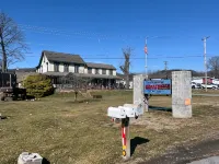 Gamble Farm Inn and Suites - Parkplatz