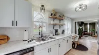Touchdown Bungalow: Charming HOF Village Home
