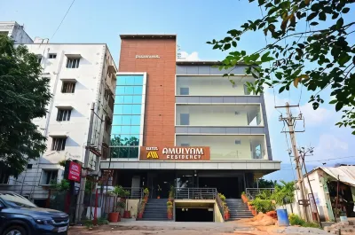 Hotel Amulyam Residency Hotels near Palem gadda Akkadevatala Temple