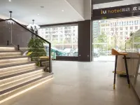 IU Hotel (Yangxincheng East People's Hospital Branch) - Esports