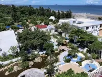 Listen to the sea shell holiday home (China's first beach shop) Hotels in Maoming