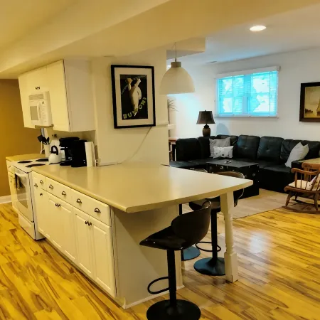 Large but cozy apartment, in a private setting. Walking distance to town.