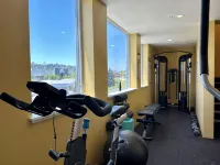 Pets Stay Free • Private Terrace • Elevator • King Beds • In-Unit W/D