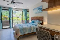 Cozy studio apartment near beach with roof top pool, AC, WiFi