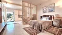 Villa Veranda, big private pool in relaxing green hills just 4 km from the beach