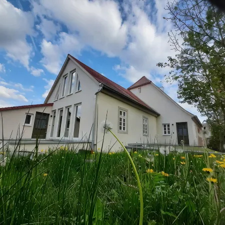Modern vacation apartment "Tanzsaal" Living in a listed half-timbered house