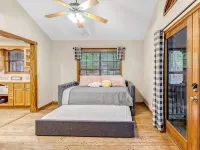 Enjoy 1.3 wooded acres and location to amenities Holly Lake has to offer. - 4-Star