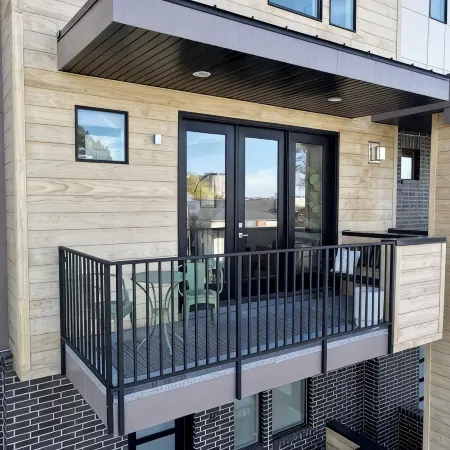Downtown Modern 3-Bed Townhome with Bright, Upgraded Interiors & Books to read