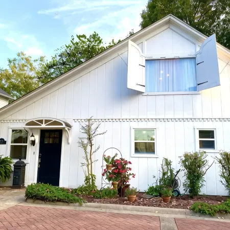 Experience History in an original Carriage House located behind a Colonial home. Hotels in Mena