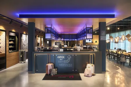 Moxy Paris Charles de Gaulle Airport Отели рядом с достопримечательностью «Парк Мэри»