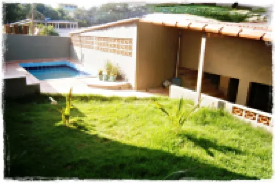 Suítes de Setiba - Hospedaria Oca Ruca Hotel di 