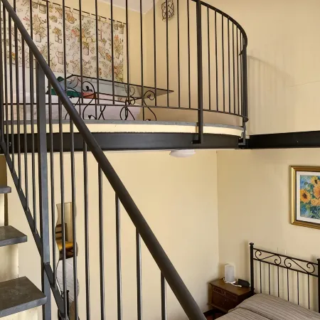 Suite Family Room with Attic and View, use of two pools at Casale del Vacanziere