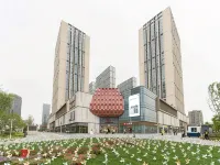Misus Apartment (Gaoxin Baolong Plaza) Восточная часть Нинбо. Новый город: отели