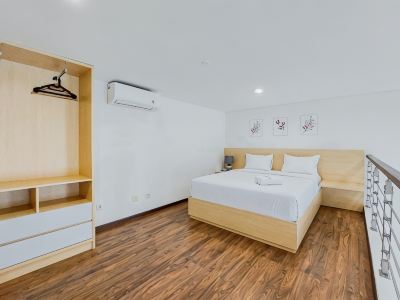 Comfort and Minimalist Studio Loft at Brooklyn Alam Sutera Apartment By Travelio