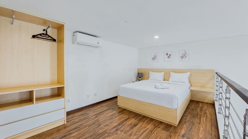 Comfort and Minimalist Studio Loft at Brooklyn Alam Sutera Apartment By Travelio