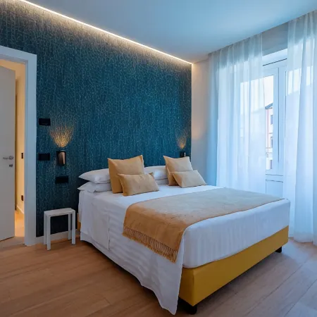 San Ambrogio Apartments Отели рядом с достопримечательностью «Сант'Еусторджио»