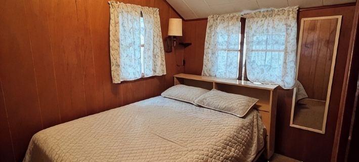 Charming 2-bedroom cabin sits on 2.5 acres on Hubbard Lake. Hotels in Alcona County