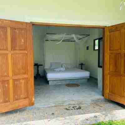 Peaceful jungle villa - 3 Ensuite Bedrooms, Infinity pool & 10 mins to the beach Rooms