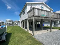 Deep-Water Canal Front Coastal Cottage Only Steps to the Beach & Pet Friendly! - ビーチサイド