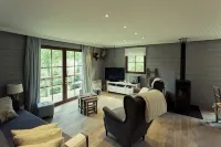 Scandinavian chalet in lush greenery and forest ... - Homestays