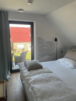 Top modern vacation apartment behind the dike - 3つ星