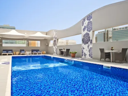 Oaks Liwa Executive Suites Отели рядом с достопримечательностью «Khalifa University Extension»