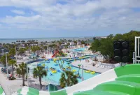 Charming Beach Cottage with Outdoor Shower and Golf Cart - Delightful Escape