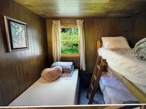 Charming 2-Bedroom Cottage Lake Property with Kayaks Firepit and Great Fishing!