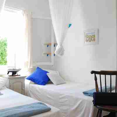 Casa Il Sole. Unifamiliar adosada casa con jardín. Cap D'Artrutx, Menorca. Rooms
