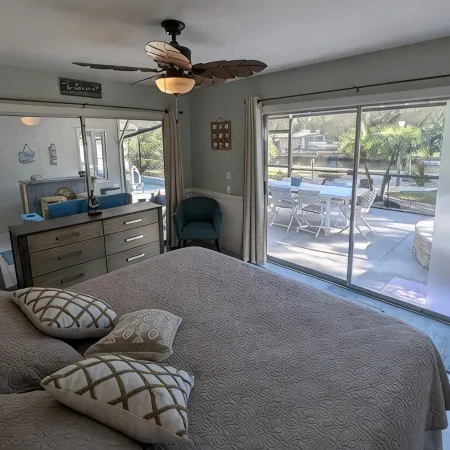 Waterfront Paradise w dock, large patio, lanai, pool, hot tub! Bring your boat!
